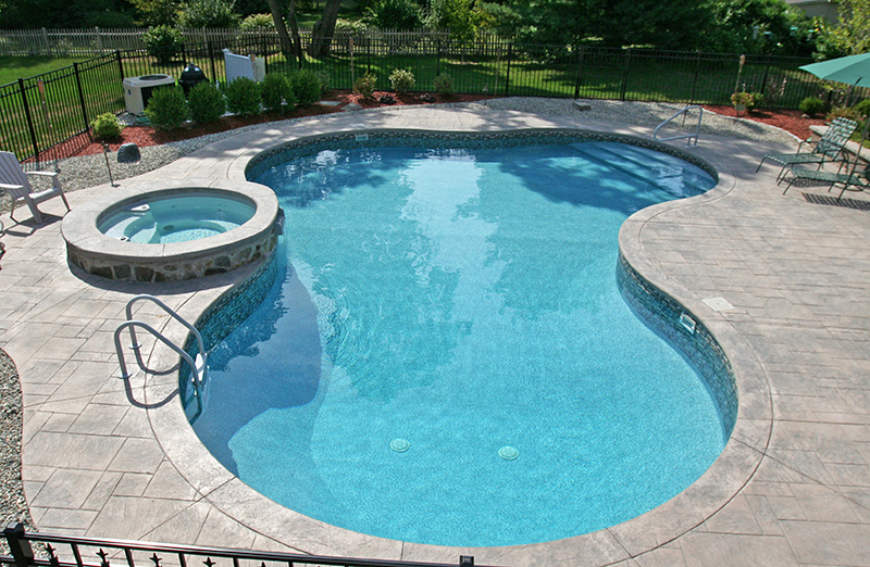 Swimming pool and stamped concrete project example 213